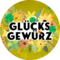 Illustration von Blüten. Davor befindet sich der Schriftzug "Glücksgewürz". | © SONNENTOR