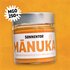 SONNENTOR MÁNUKA organic blossom honey from New Zealand in a jar with a silver lid and the icon ‘MGO 250+’ on an orange background.