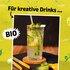 Illustration mit Foto eines Glases Bergamotten Sirup von SONNENTOR mit dem Schriftzug: "Für kreative Drinks" auf  gelb-grünem Hintergrund am Etikett.