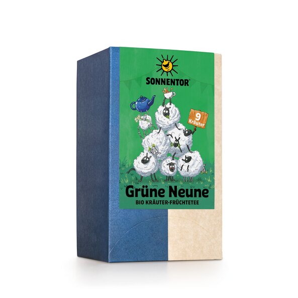 Green nine tea pack with sheep on the label, artistically arranged in a pyramid on a green background.
